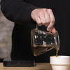 Pouring coffee out of a decanter